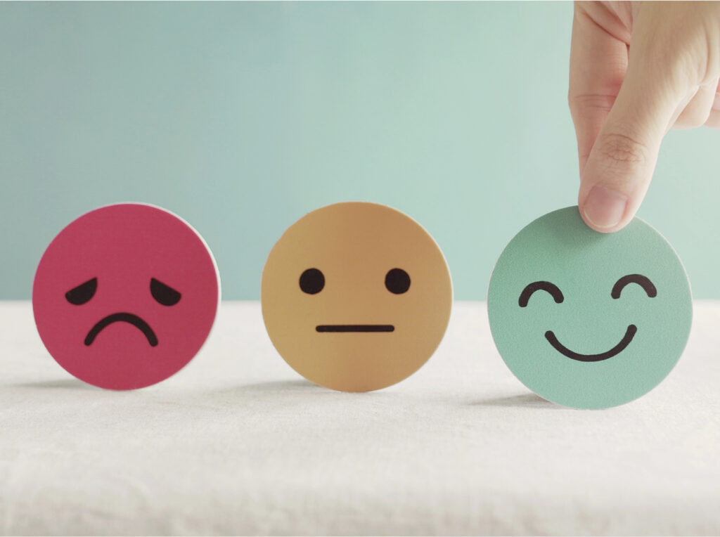 sad neutral and happy emoji faces